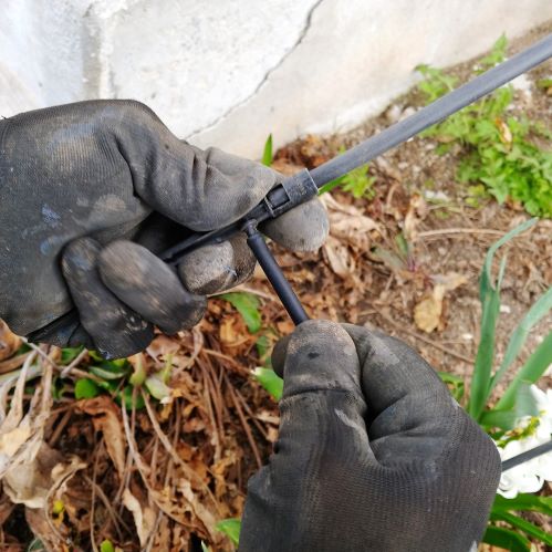 Pressing tubing onto emitter