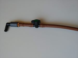 Close-up of a barbed ball valve in a 1/2 inch drip line