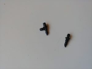 Close-up of drip line puncture connectors